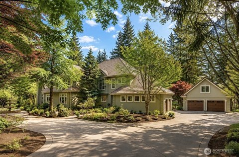 Large luxury home with immaculate driveway and landscaping